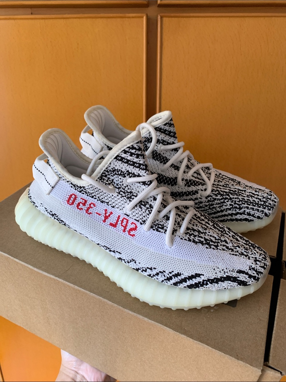 Yeezy 350 V2 Zebra Women’s Athletic Sneakers in White/Black